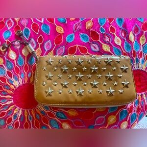 Caramel Jimmy Choo Italian leather w star studs. Apx 7.5 x4.5 “. EUC